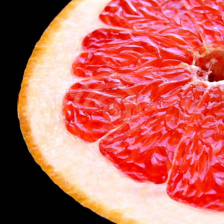 Grapefruit cut in half with fresh cells showing